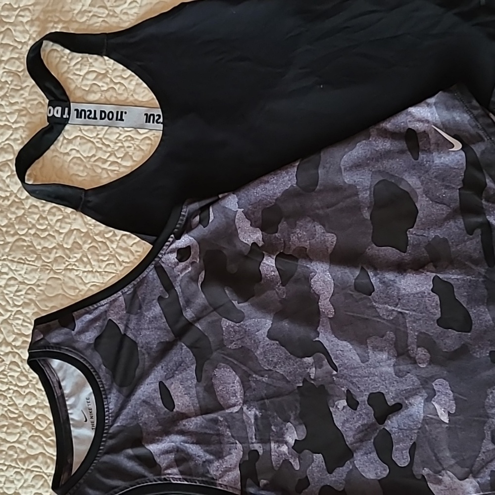 Nike tank tops ( bundle of 2) both are size XS